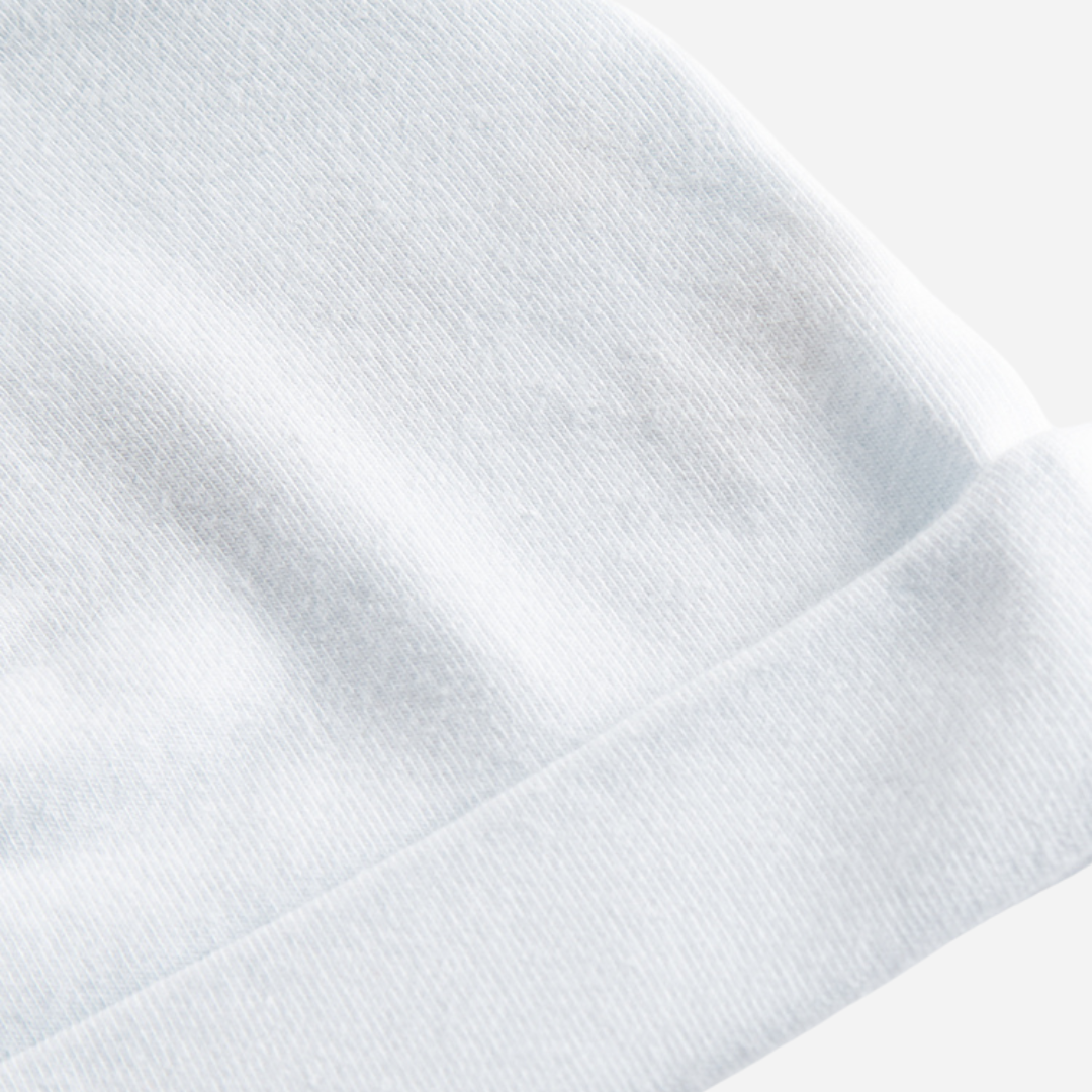 Sold at Bombon shop, designed by MarMar Copenhagen — powder blue organic cotton baby hat with fold-over brim.