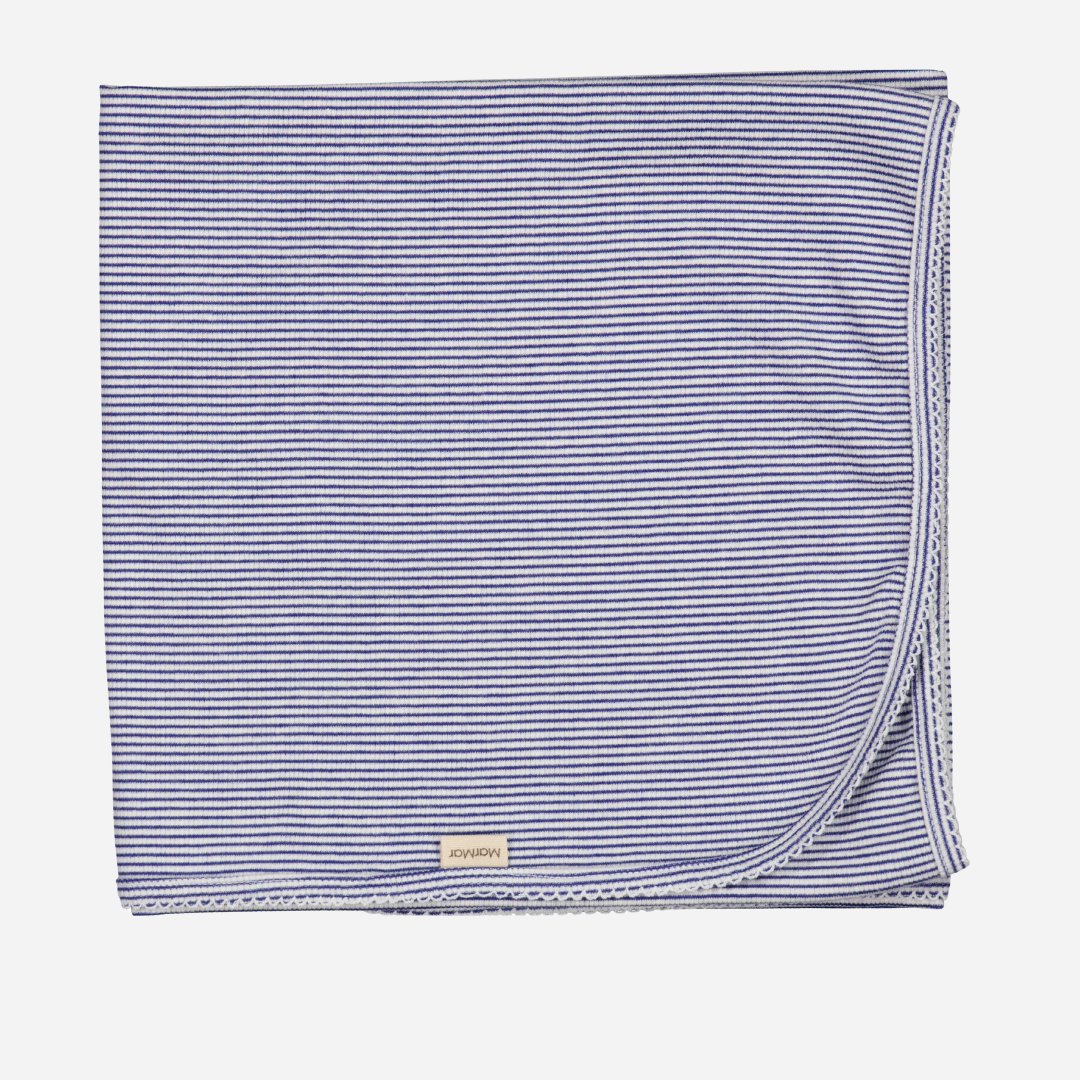 Sold at Bombon shop, designed by Mar Mar Copenhagen brand, this soft blanket in a thin blue line print for baby boys is perfect for any occasion.