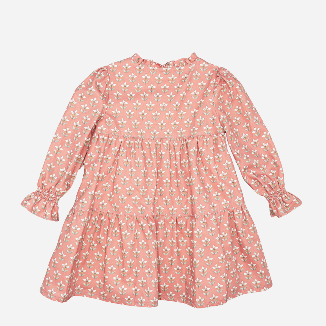 Pink floral dress on a light gray background