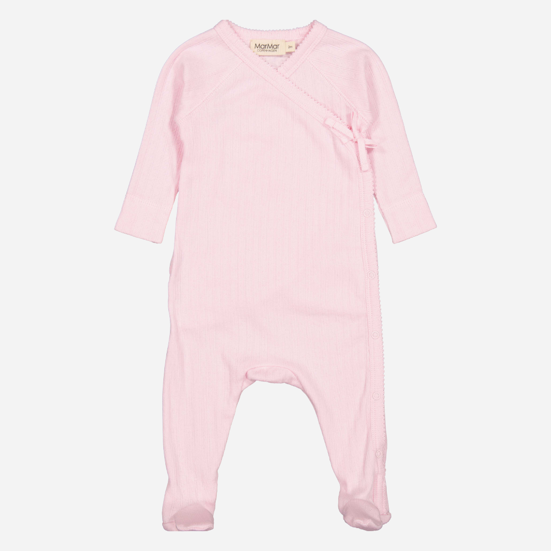 Sold at Bombon shop, designed by Mar Mar Copenhagen brand, this soft jumpsuit with feet in a perfect cotton candy pink for baby girls is perfect for any occasion.