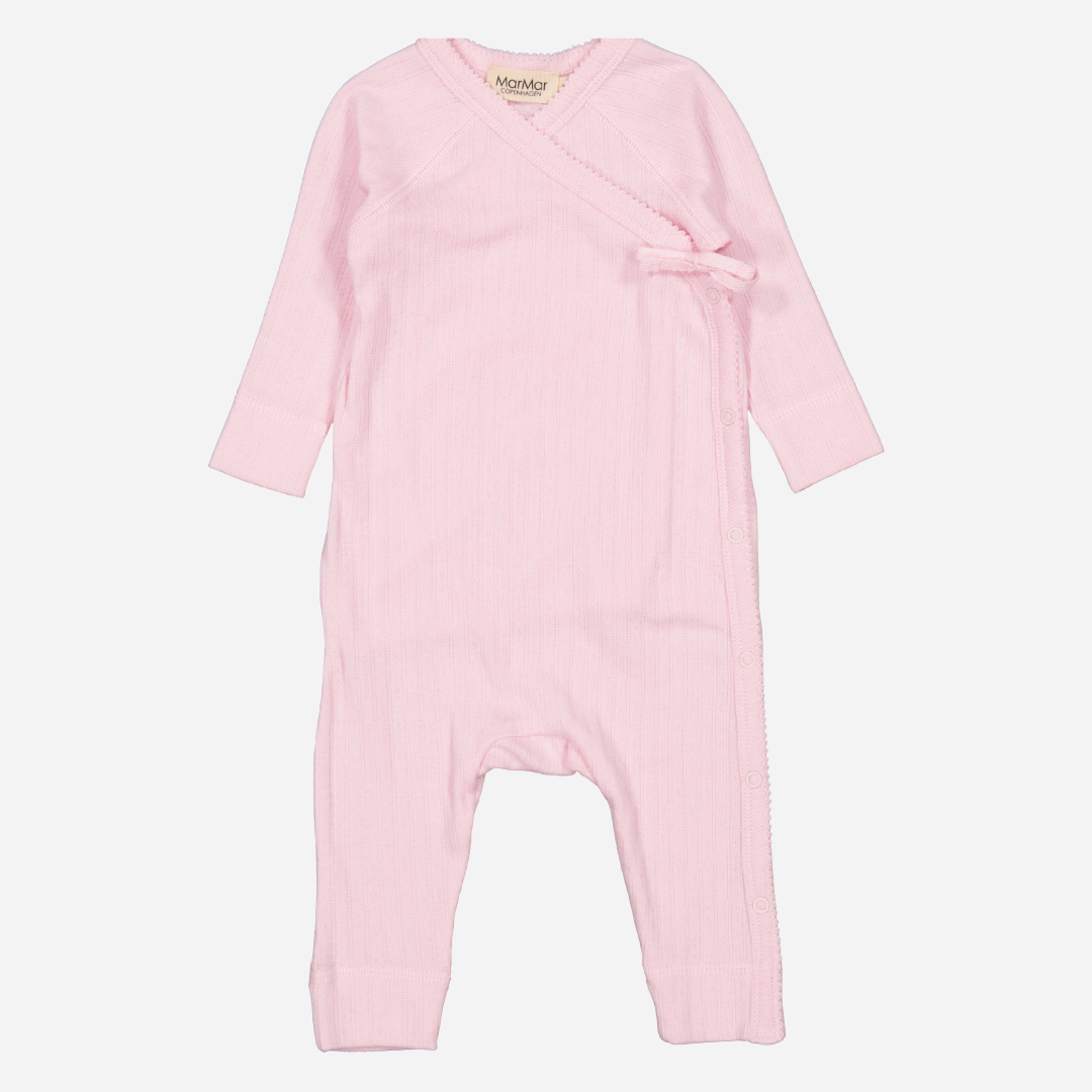Sold at Bombon shop, designed by Mar Mar Copenhagen brand, this soft jumpsuit in a perfect cotton candy pink for baby girls is perfect for any occasion.
