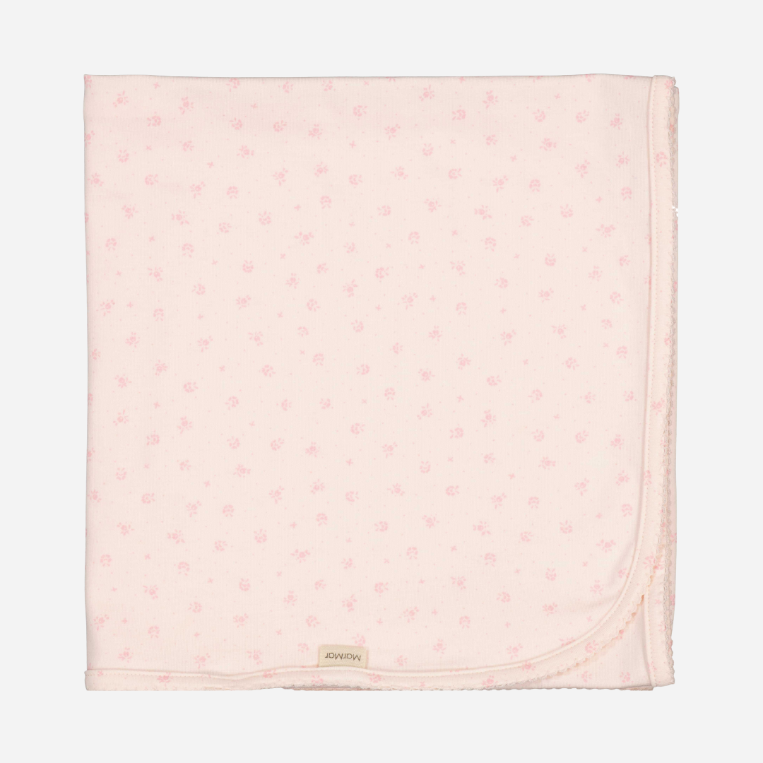 Sold at Bombon shop, designed by Mar Mar Copenhagen brand, this soft blanket in a cute floral print for baby girls is perfect for any occasion.