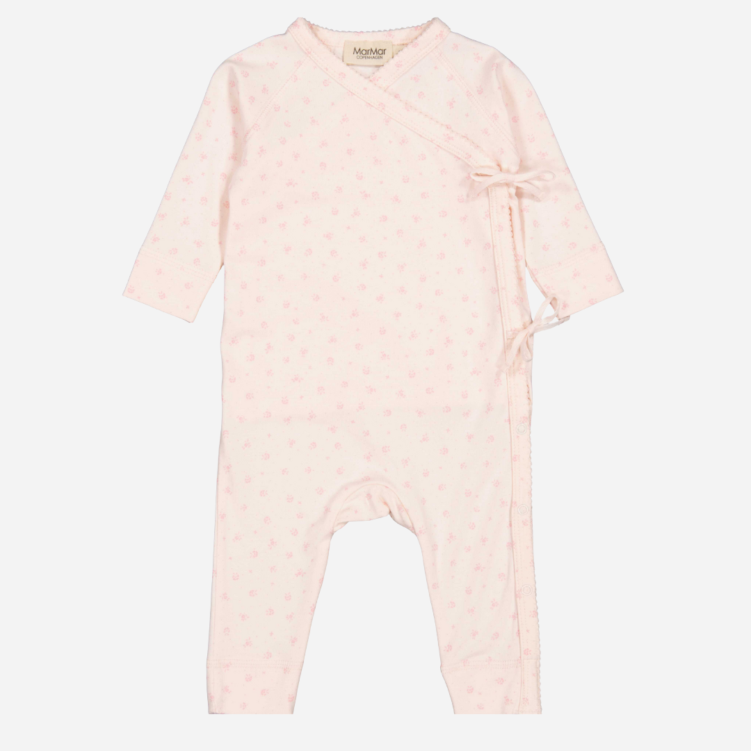 Sold at Bombon shop, designed by Mar Mar Copenhagen brand, this soft jumpsuit in a cute floral print for baby girls is perfect for any occasion.