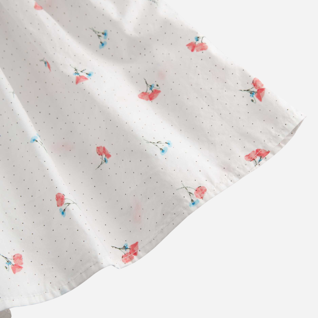 Sold at Bombon shop, designed by Mar Mar Copenhagen, Dalino baby dress in Poppy print with ruffled collar