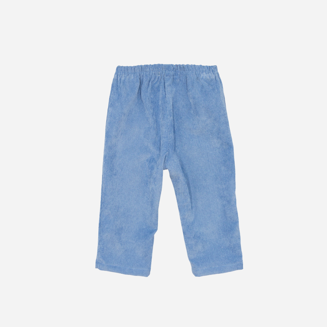 Sold at Bombon shop, designed by Fina Ejerique, blue corduroy baby trousers with elastic waistband and back pockets. back