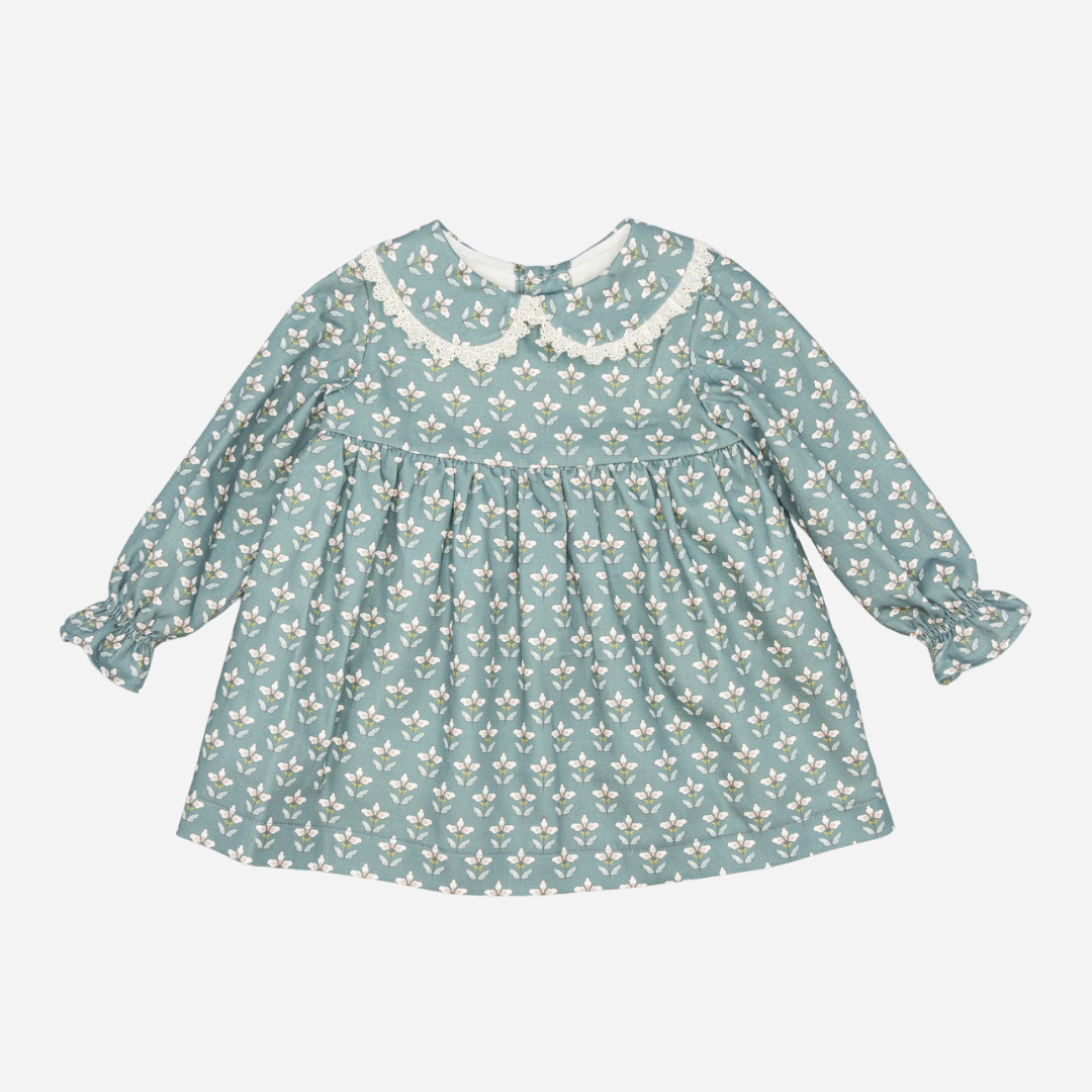 Sold at Bombon shop, designed by Fina Ejerique, a sage green floral baby dress with lace-trim collar and long sleeves. front