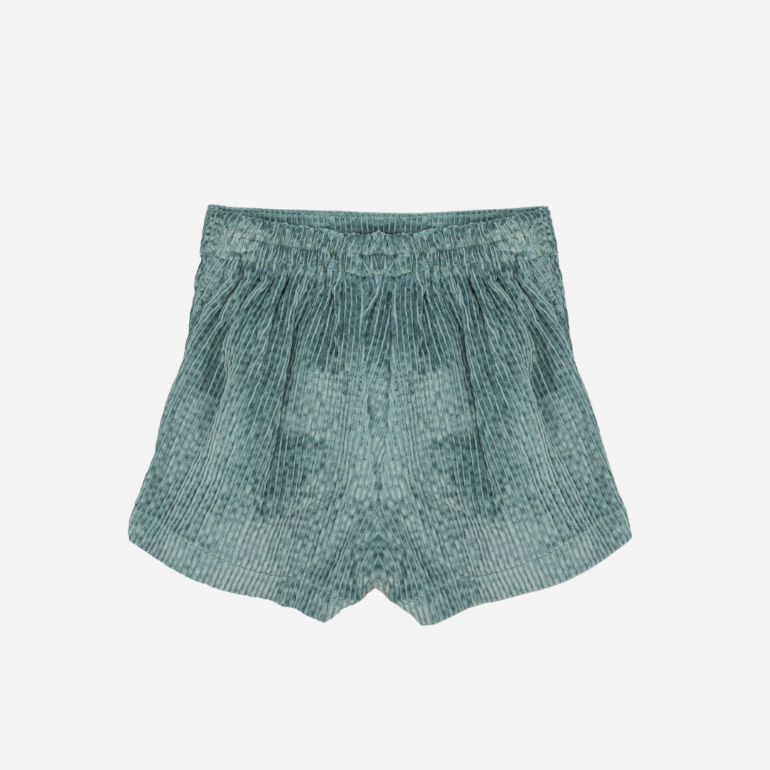 Sold at Bombon shop, designed by Fina Ejerique, green corduroy shorts with back pockets and bow detail, pairs perfectly with the green floral viyella blouse. back