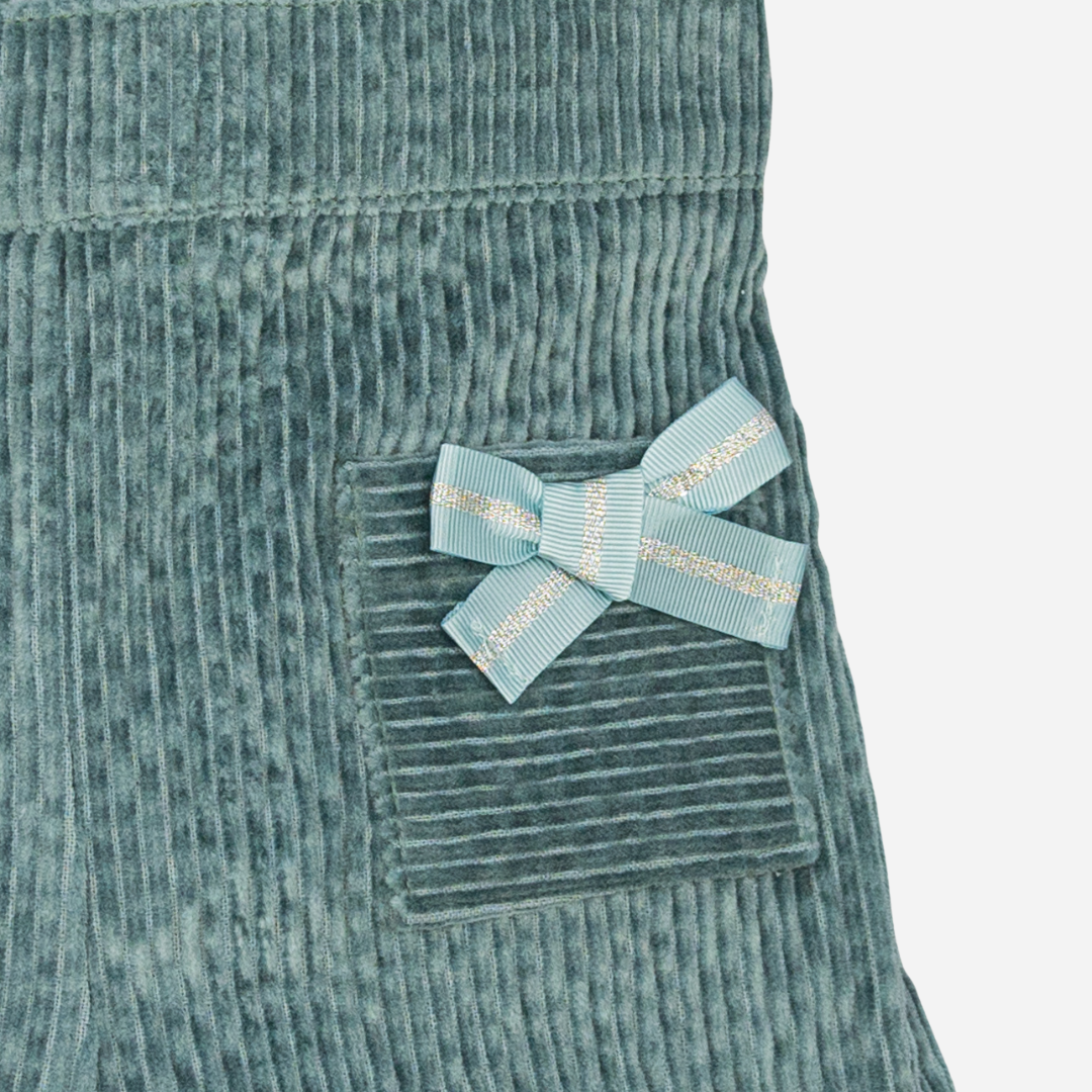 Sold at Bombon shop, designed by Fina Ejerique, green corduroy shorts with back pockets and bow detail, pairs perfectly with the green floral viyella blouse. zoom