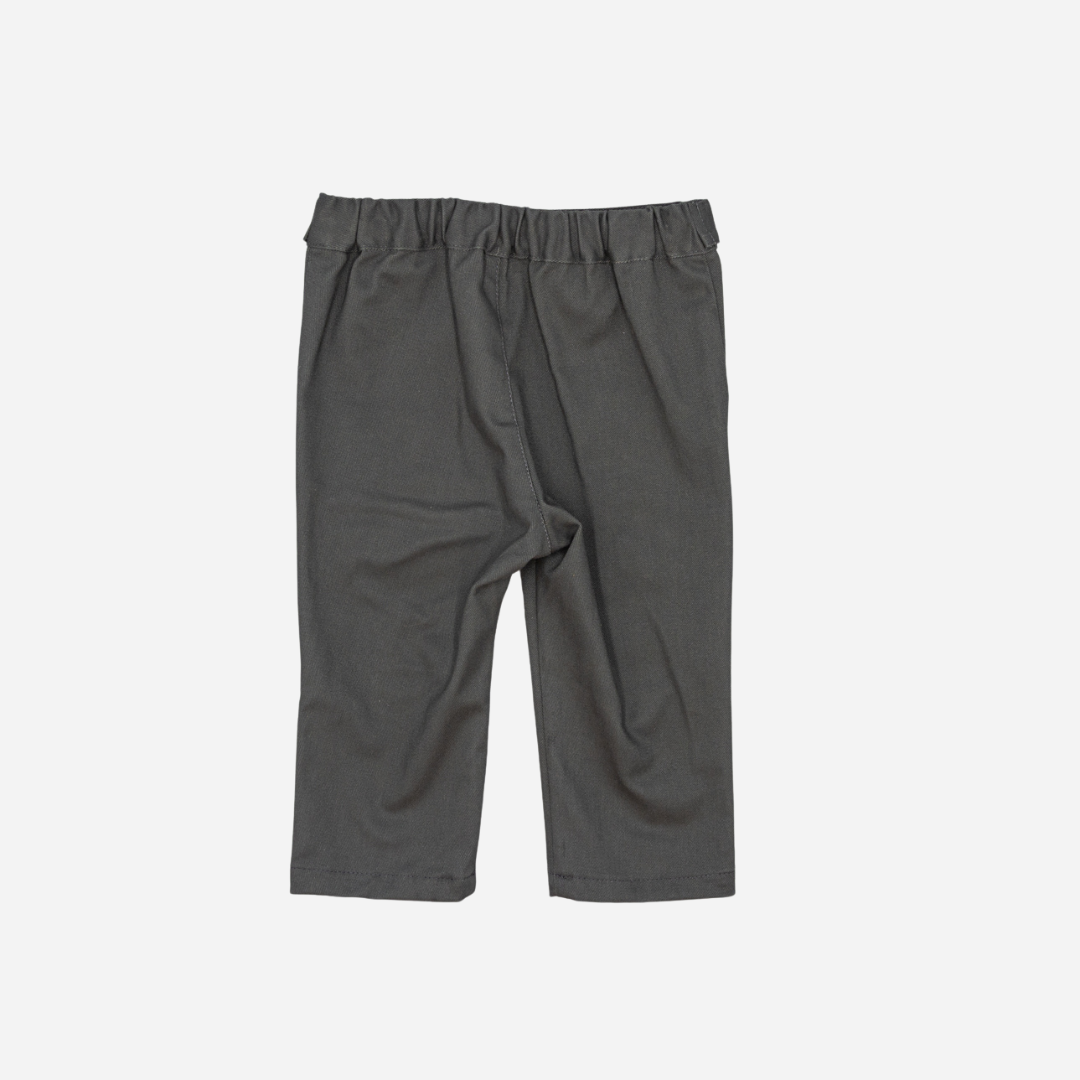 Sold at Bombon shop, designed by Fina Ejerique, gray twill baby trousers with waistband button details and side pockets. back