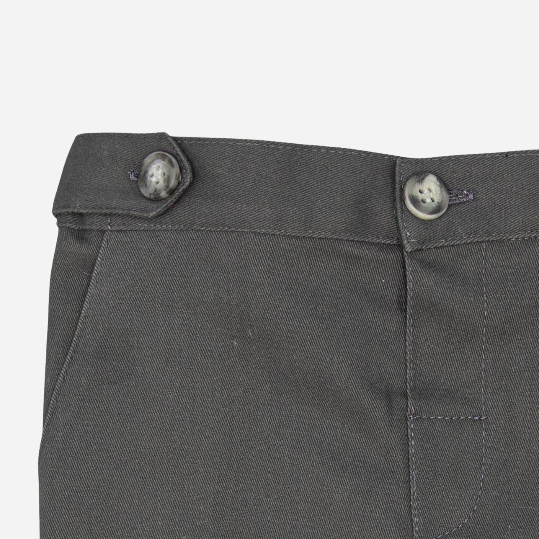 Sold at Bombon shop, designed by Fina Ejerique, gray twill baby trousers with waistband button details and side pockets. zoom