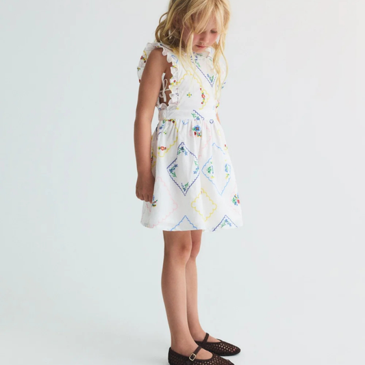sold at Bombon, designed by The New Society girls dress with multicolor floral embroidery in 100% cotton sleeveless silhouette matching sibling outfit
