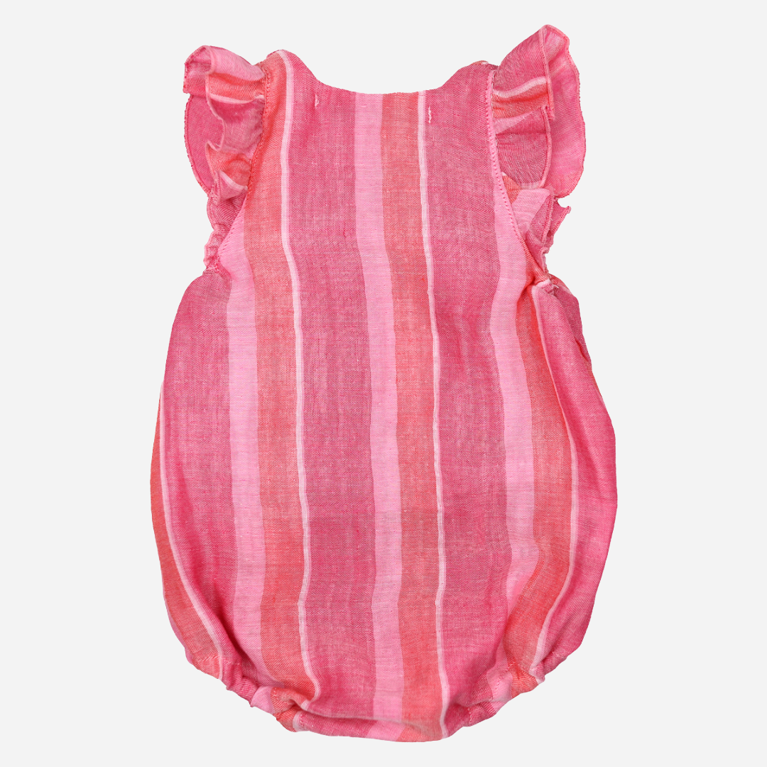 sold at bombon shop, designed by al agua patos brand, this madras print baby romper for girls is perfect for spring and summer. back view