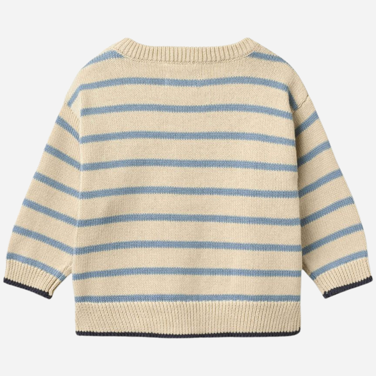 Sold at Bombon Shop, designed by Wheat, faded denim stripe organic cotton knit pullover with soft blue and neutral horizontal stripes.