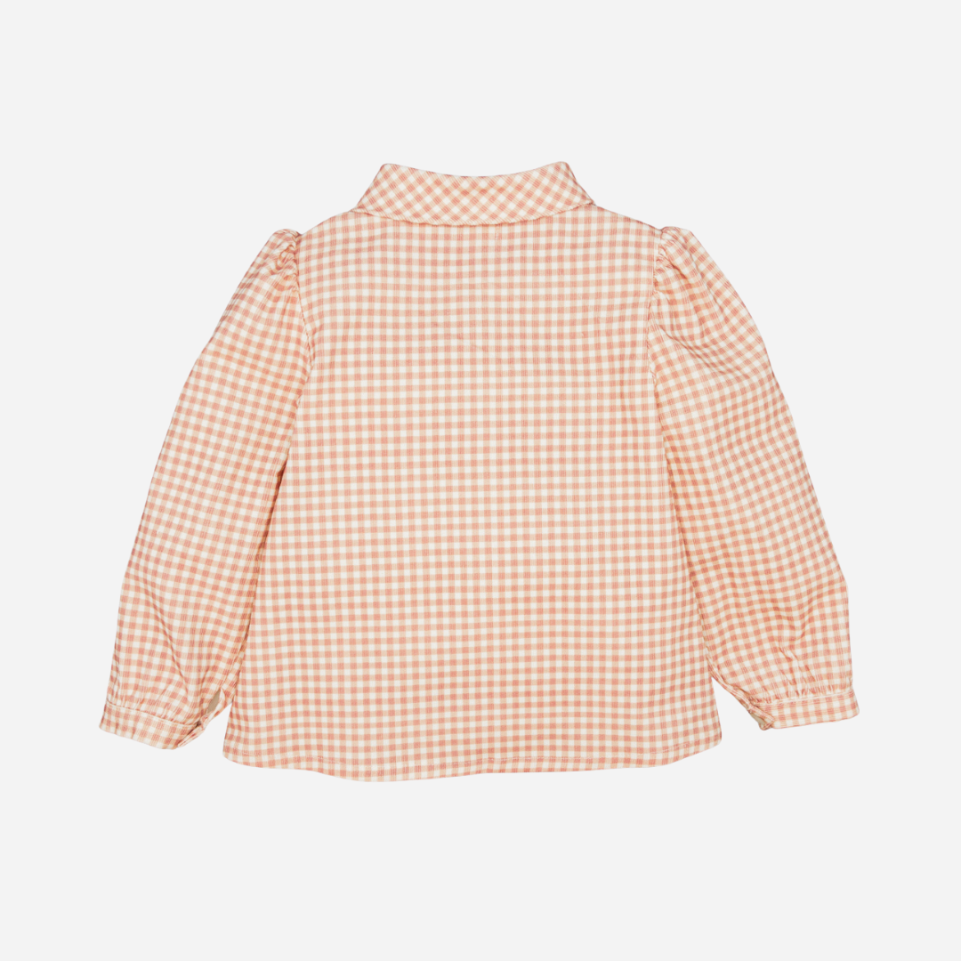 Sold at Bombon shop, designed by Fina Ejerique, pink gingham corduroy blouse with bow collar and puffed shoulders, styled to pair with the matching pants. back