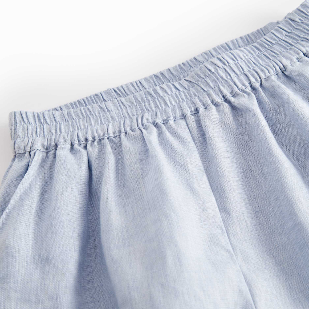 Sold at Bombon shop, designed by Mar Mar Copenhagen, Pinon children’s shorts in Blue Mist linen