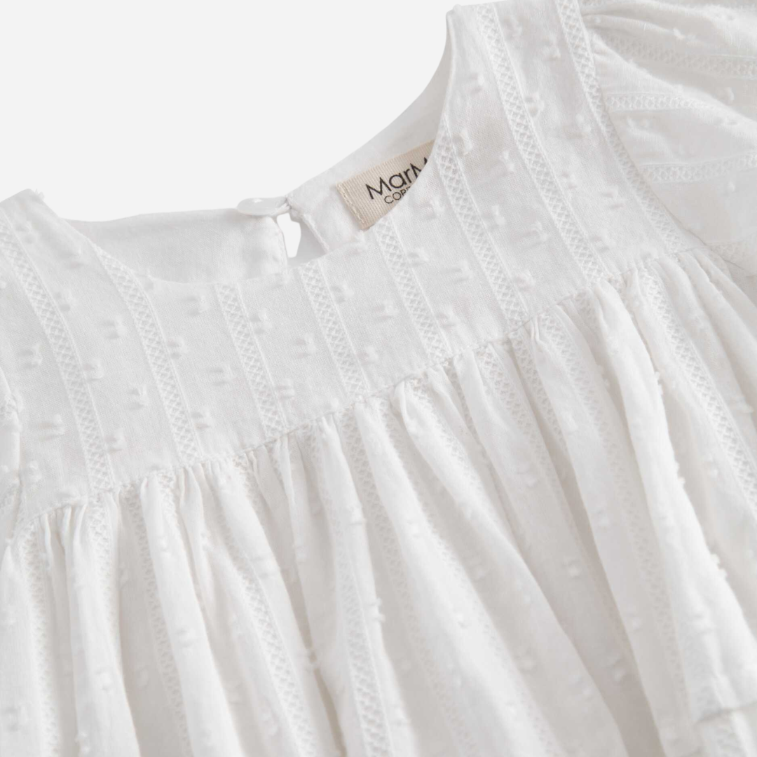 Sold at Bombon shop, designed by Mar Mar Copenhagen, Ritona baby bodysuit in White with puff sleeves
