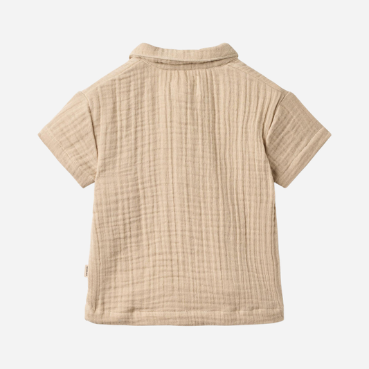 Sold at Bombon Shop, designed by Wheat, warm sand organic cotton short sleeve shirt with soft textured fabric and classic collar.