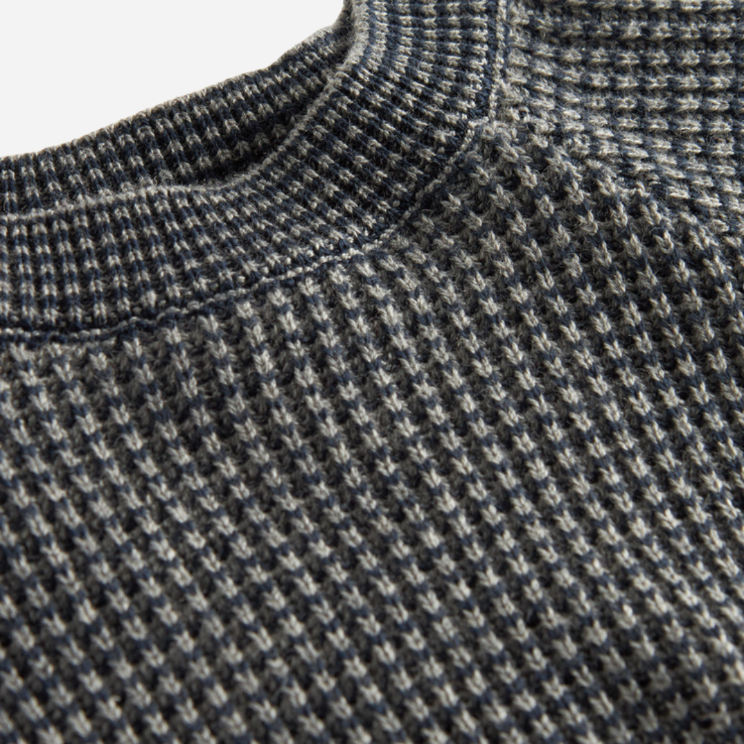 Sold at Bombon shop, designed by MarMar Copenhagen. Blue and beige textured knit baby sweater with shoulder buttons, pairs perfectly with the matching knit pants.