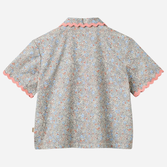 Sold at Bombon Shop, designed by Wheat, air blue flowers organic cotton short sleeve blouse with lace trim and soft blue floral print.