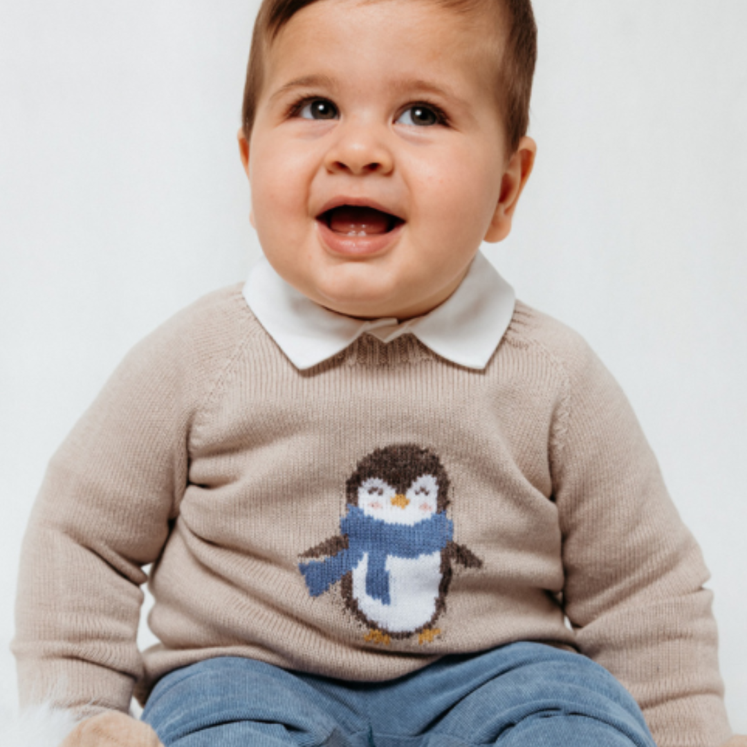 Sold at Bombon shop, designed by Fina Ejerique, blue corduroy baby trousers with elastic waistband and back pockets. model