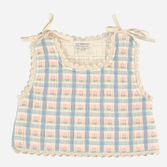 Sold at Bombon Shop, this Bebe Organic baby and toddler girl top features a soft pastel plaid pattern in blue, pink, and cream, crafted from organic cotton with scalloped trim and delicate shoulder ties — pair it with the matching pants for a complete vintage-inspired look