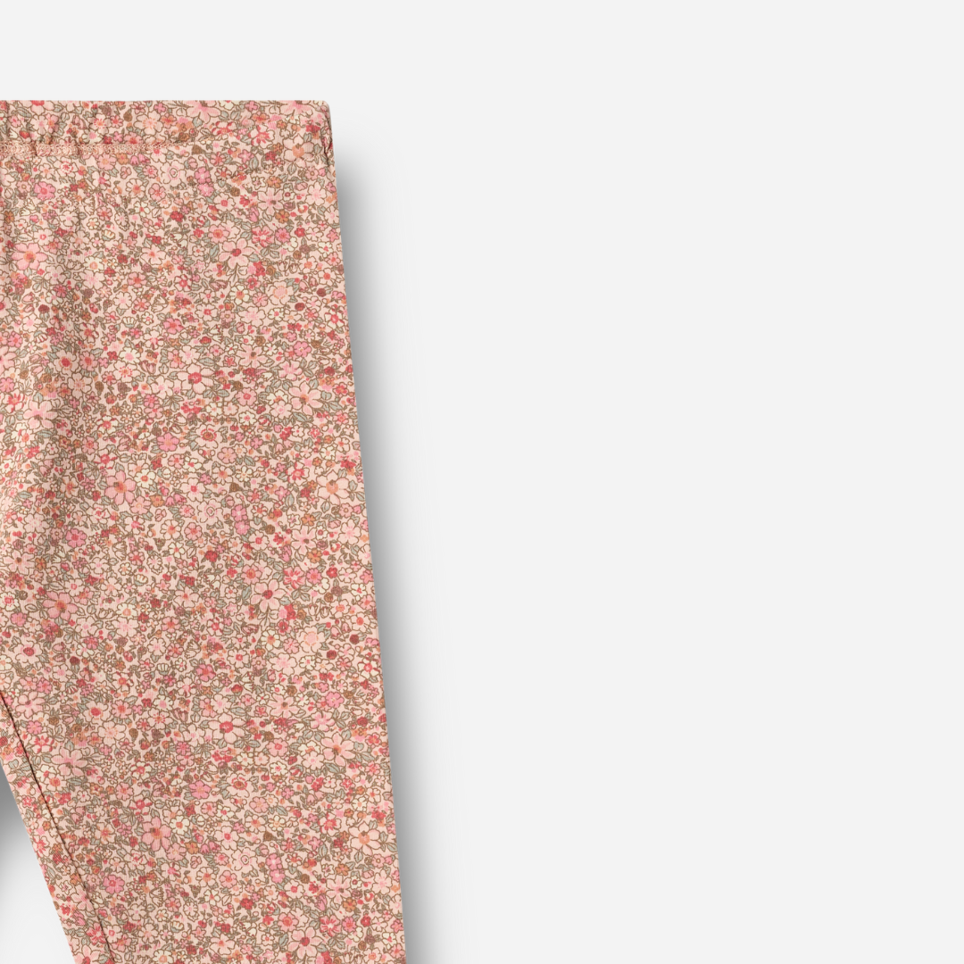 Sold at Bombon shop, designed by Wheat, these floral leggings feature a delicate dusty pink print and a comfy elastic waistband. zoom top