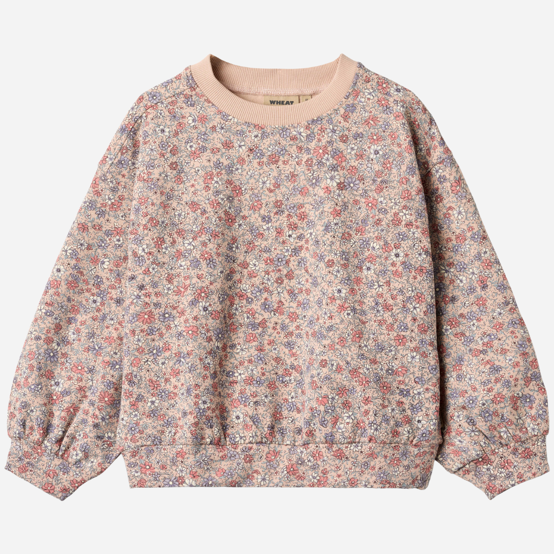 Sold at Bombon shop, designed by Wheat, this floral sweatshirt features a vintage-inspired allover print and soft ribbed cuffs. front