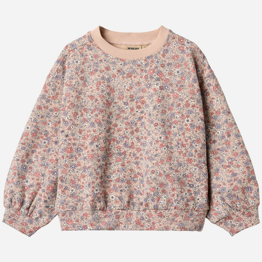 Sold at Bombon shop, designed by Wheat, this floral sweatshirt features a vintage-inspired allover print and soft ribbed cuffs. front