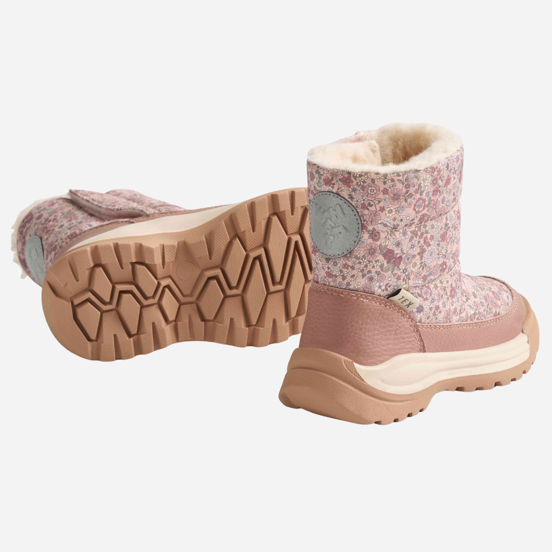 Sold at Bombon shop, designed by Wheat — floral rose dust winter boots with fleece lining, waterproof upper, and side zipper closure. bottom