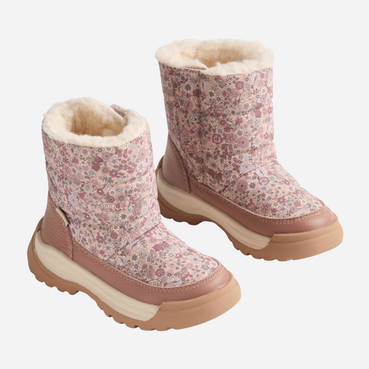 Sold at Bombon shop, designed by Wheat — floral rose dust winter boots with fleece lining, waterproof upper, and side zipper closure. pair