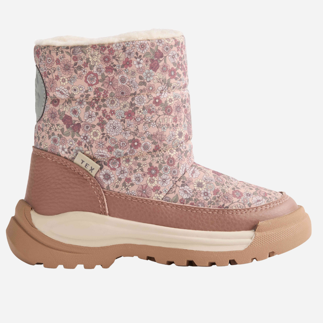 Sold at Bombon shop, designed by Wheat — floral rose dust winter boots with fleece lining, waterproof upper, and side zipper closure. side