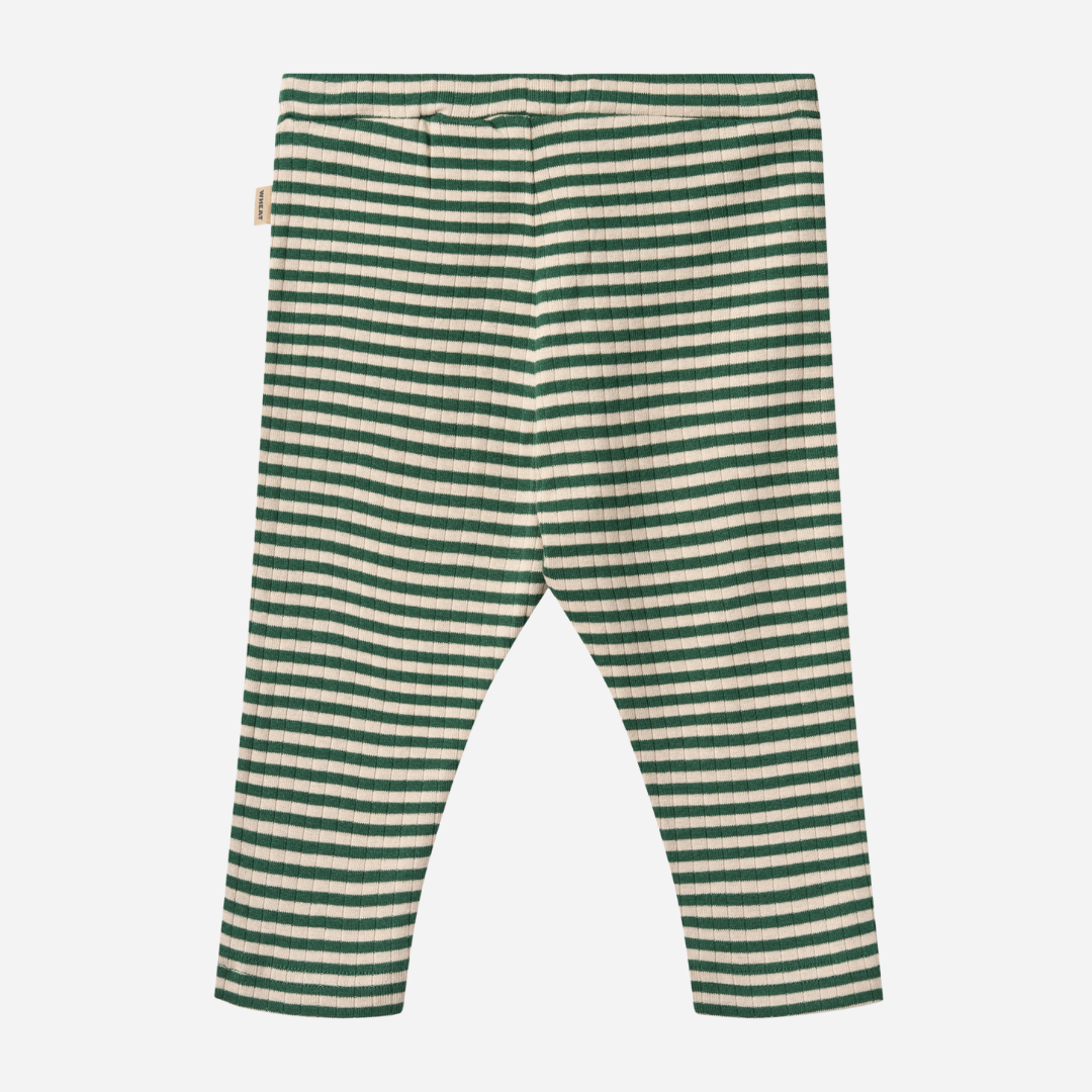 Sold at Bombon shop, designed by Wheat, green and cream striped ribbed baby pants with an elastic waist and drawstring tie. back