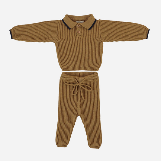 Sold at Bombon Shop, this Bebe Organic baby and toddler knit set features a ribbed organic wool polo-style sweater with button placket and contrast trim, paired with matching drawstring pants — a refined and cozy outfit perfect for fall and winter layering with timeless European charm.