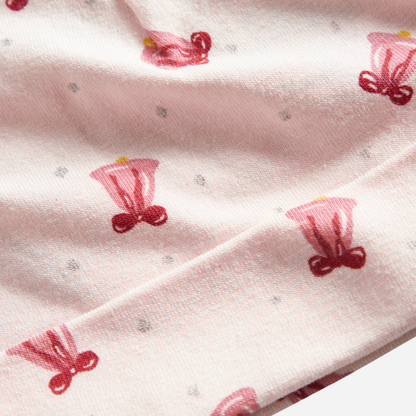 Sold at Bombon shop, designed by MarMar Copenhagen. Blush pink baby hat with pink bell print, pairs perfectly with the matching wrap footie and blanket.