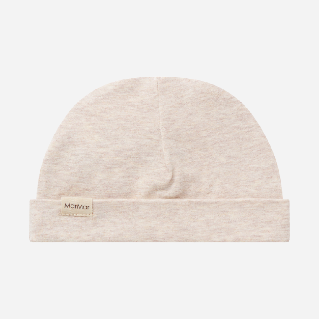 Sold at Bombon shop, designed by MarMar Copenhagen — beige organic cotton baby hat with fold-over brim.