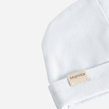 Sold at Bombon shop, designed by MarMar Copenhagen — powder blue organic cotton baby hat with fold-over brim.