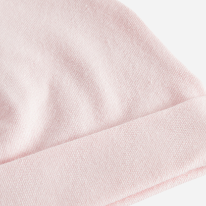 Sold at Bombon shop, designed by MarMar Copenhagen — blush pink organic cotton baby hat with fold-over brim.