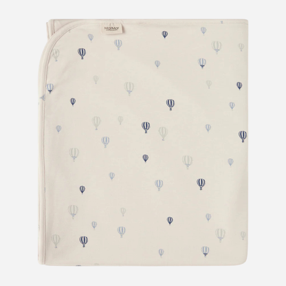 Sold at Bombon shop, designed by MarMar Copenhagen. Cream wrap footie with blue air balloon print, pairs perfectly with the matching air balloon hat and blanket.
