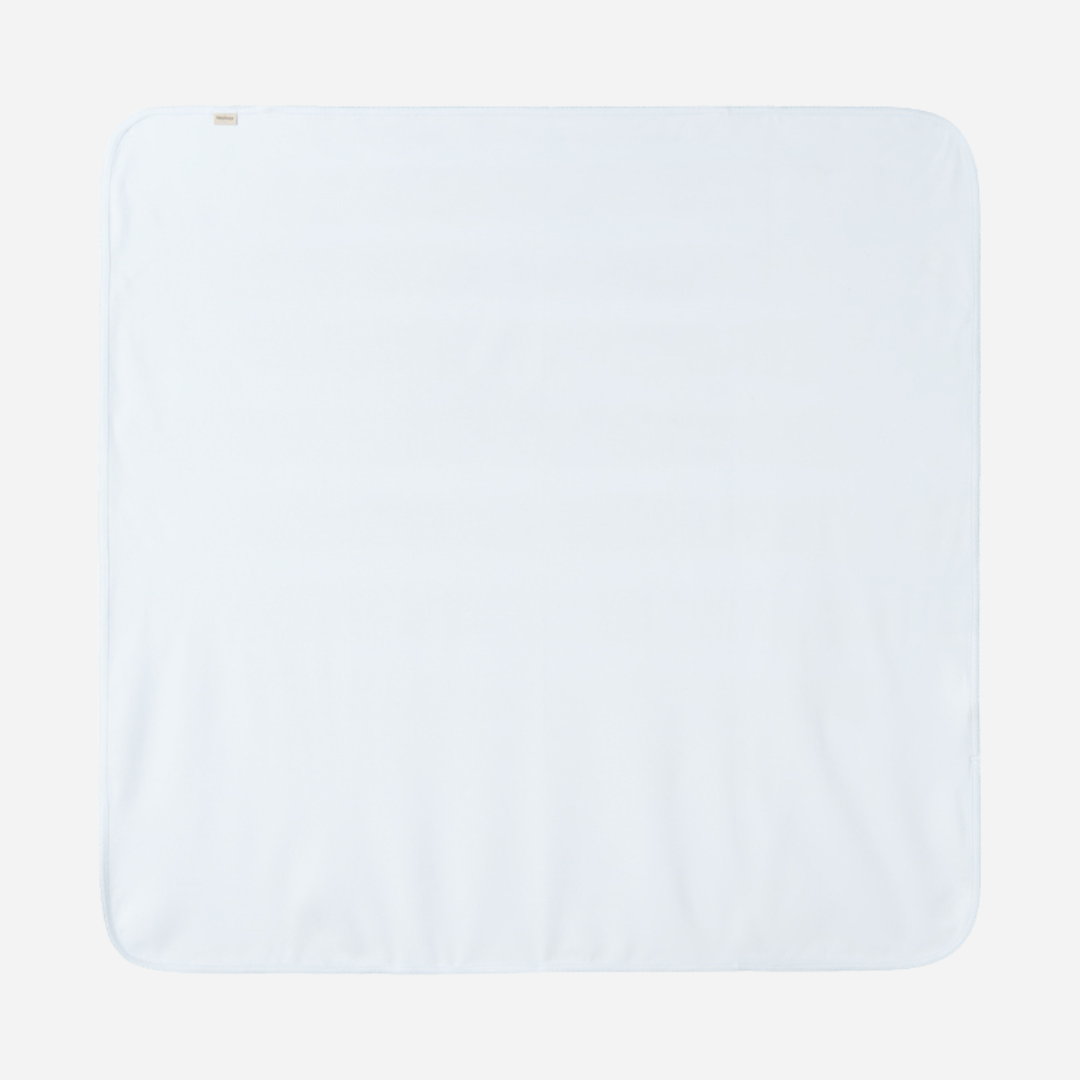 Sold at Bombon shop, designed by MarMar Copenhagen — powder blue organic cotton baby blanket with scalloped edge.