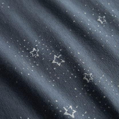Sold at Bombon shop, designed by MarMar Copenhagen. Midnight blue baby blanket with white star print, pairs perfectly with the matching wrap footie and hat.