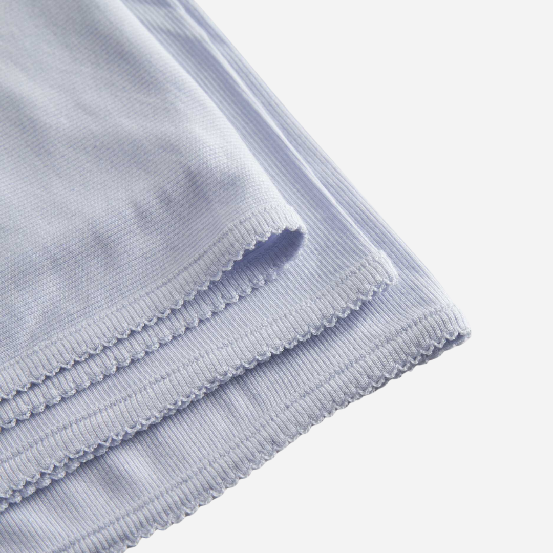 Sold at Bombon shop, designed by Mar Mar Copenhagen, Alida soft modal baby blanket in Blue Mist