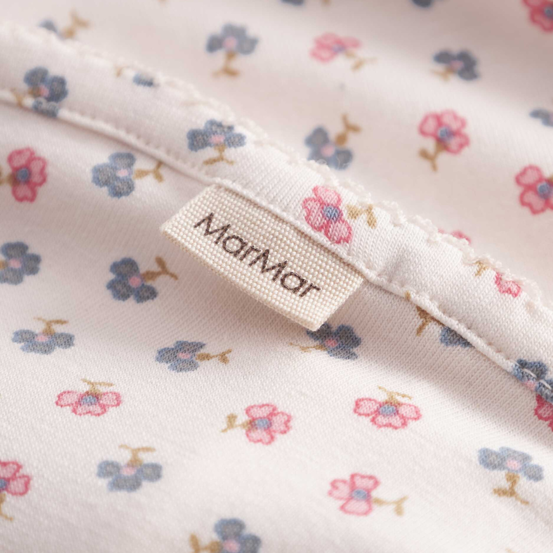 Sold at Bombon shop, designed by Mar Mar Copenhagen, Alida baby blanket in Mini Flower print modal and organic cotton blend