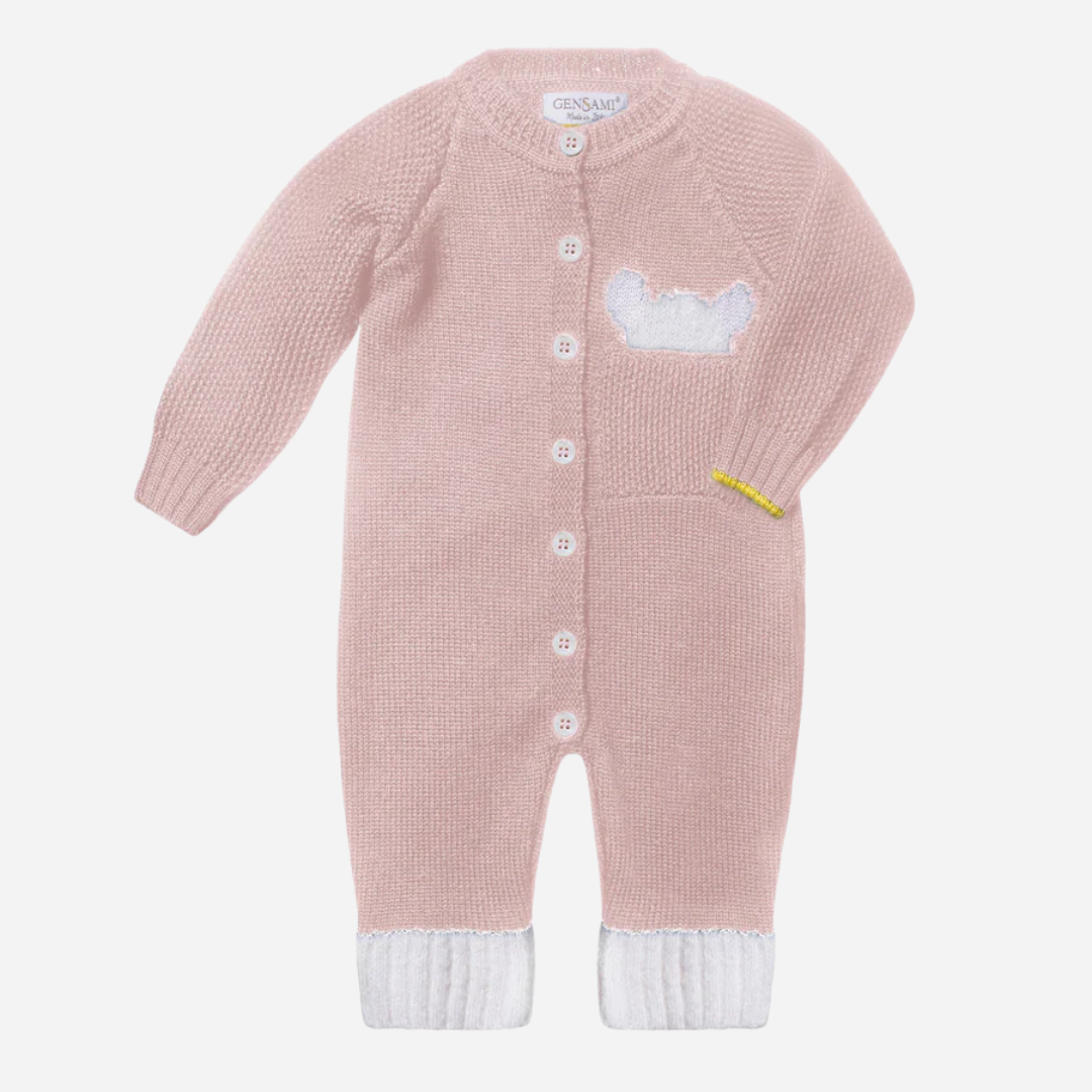 Sold at Bombon and designed by Gensami, a soft pink knit baby romper featuring front buttons, white ribbed cuffs, a bear motif on the chest pocket, and a yellow trim detail on the sleeve.