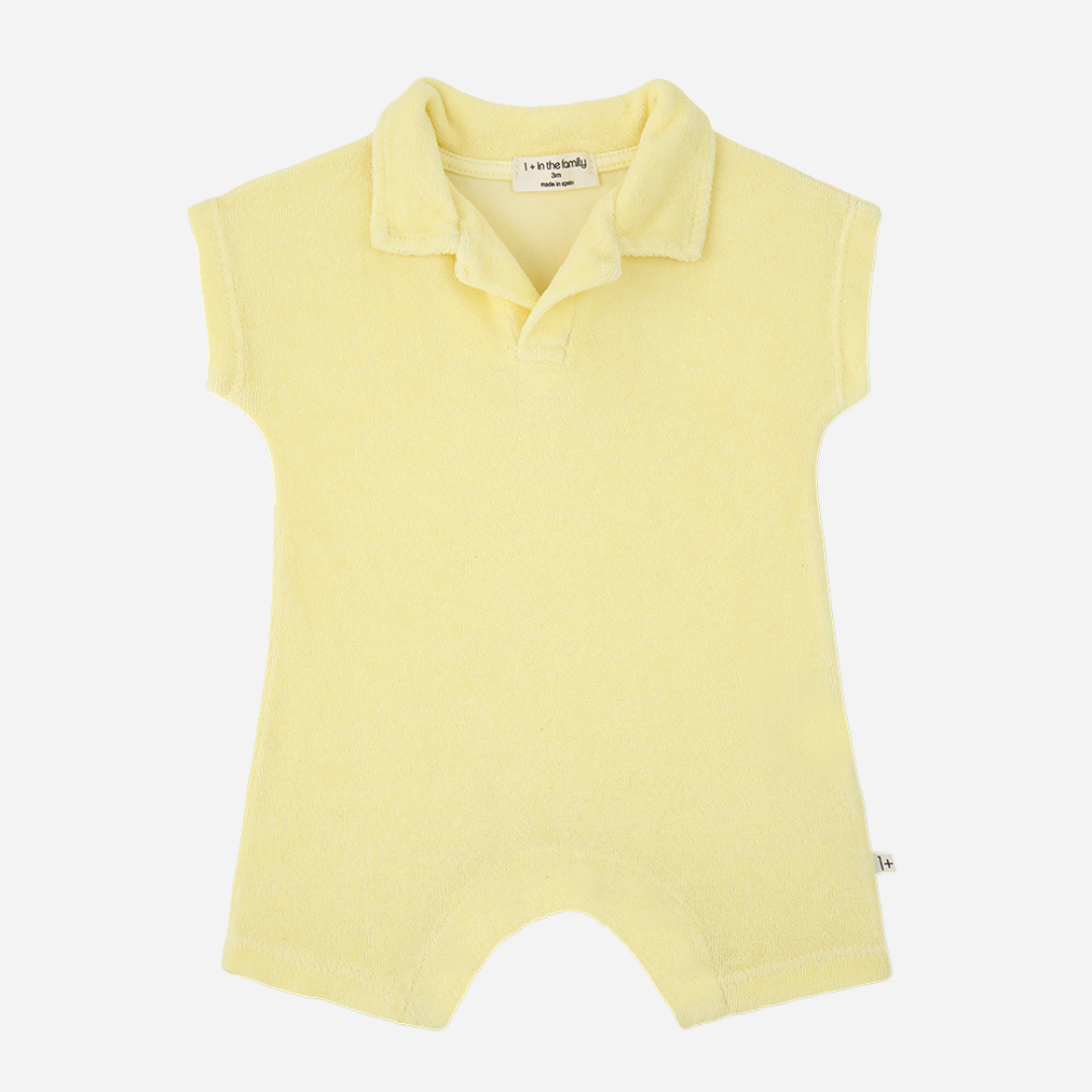 Sold at Bombon Shop, designed by 1+ in the family, lemon baby romper with soft cotton fabric and polo-style collar.