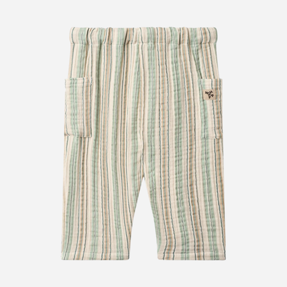 Sold at Bombon Shop, designed by Wheat, summer stripe organic cotton baby trousers with elastic waistband and vertical striped pattern.