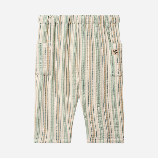 Sold at Bombon Shop, designed by Wheat, summer stripe organic cotton baby trousers with elastic waistband and vertical striped pattern.