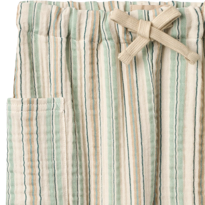 Sold at Bombon Shop, designed by Wheat, summer stripe organic cotton baby trousers with elastic waistband and vertical striped pattern.