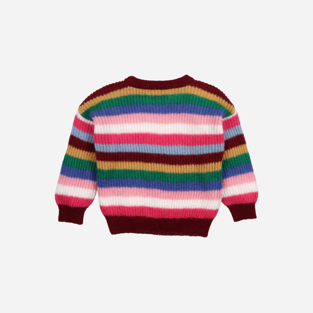 Sold at Bombon Shop, this girls’ sweater by The New Society features bold multicolor stripes in a soft ribbed knit, blending playful tones of pink, burgundy, green, and blue with a cozy crewneck silhouette. back