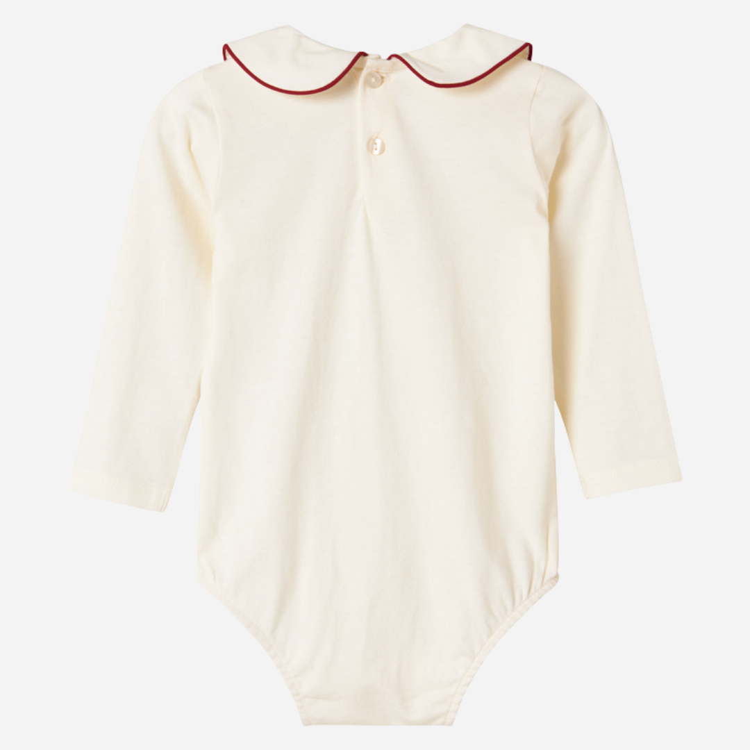 Sold at Bombon shop, designed by MarMar Copenhagen. Cream long-sleeve bodysuit with red embroidered collar, pairs perfectly with the red plaid bloomers and matching red cardigan.