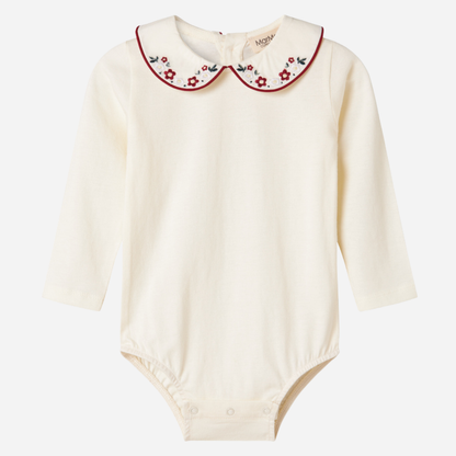 Sold at Bombon shop, designed by MarMar Copenhagen. Cream long-sleeve bodysuit with red embroidered collar, pairs perfectly with the red plaid bloomers and matching red cardigan.